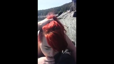 Red hair painted girl sucks dick outdoors and swallows