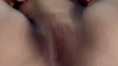 Amateur busty brunette masturbates and does hand job