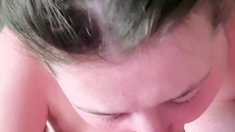 Big tit brunette sucks a big cock blowjob POV