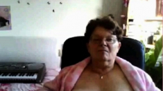 naughty granny flashing her big tits on cam